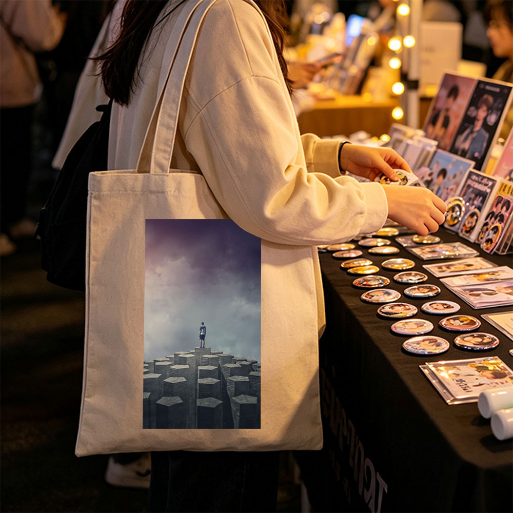 Imagine Dragons Standing on Stone Pillars Under Dramatic Sky - Canvas tote bags