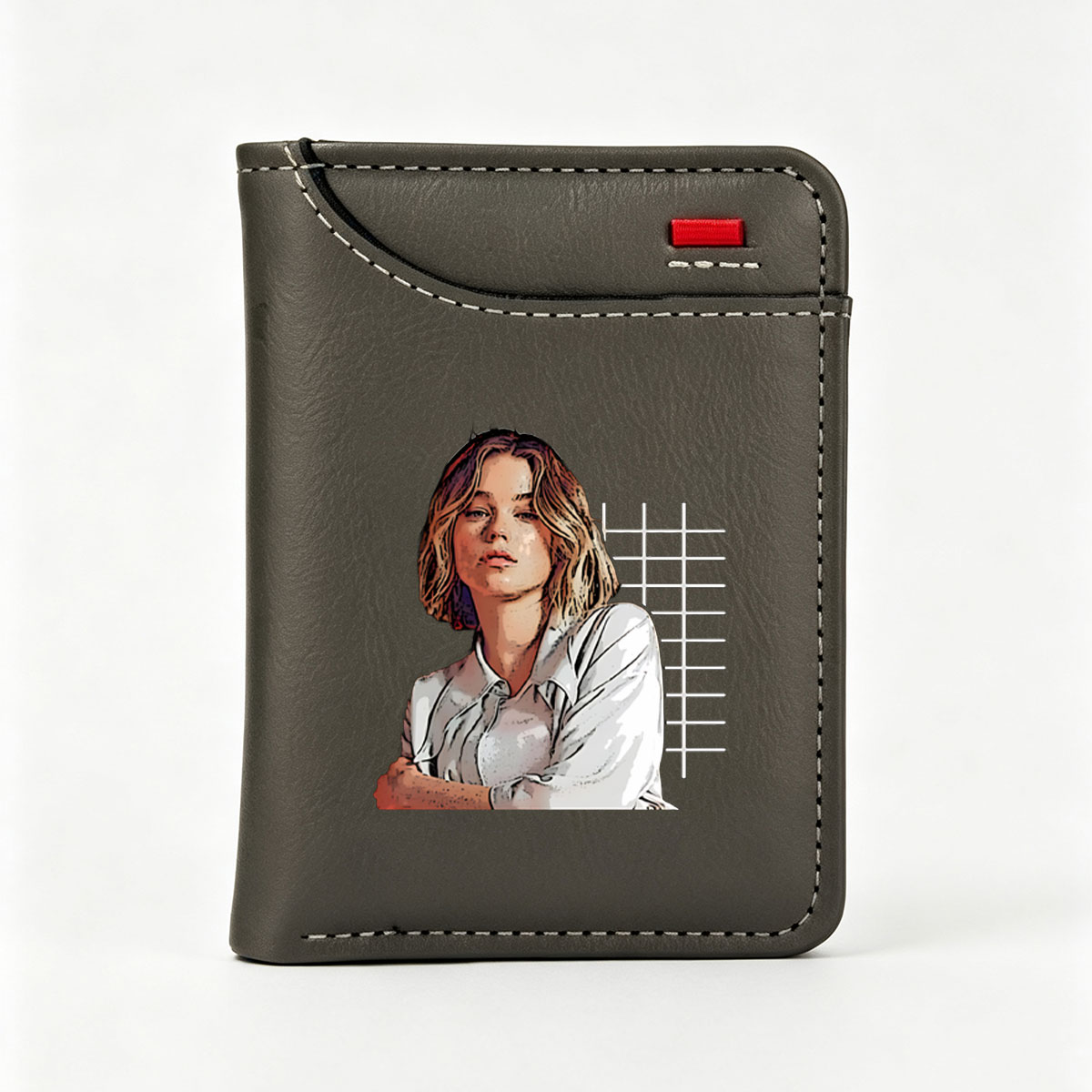 Portrait of a woman with short blonde hair, wearing a white shirt, arms crossed, against a black background with a grid pattern. - Vertical Style Wallet