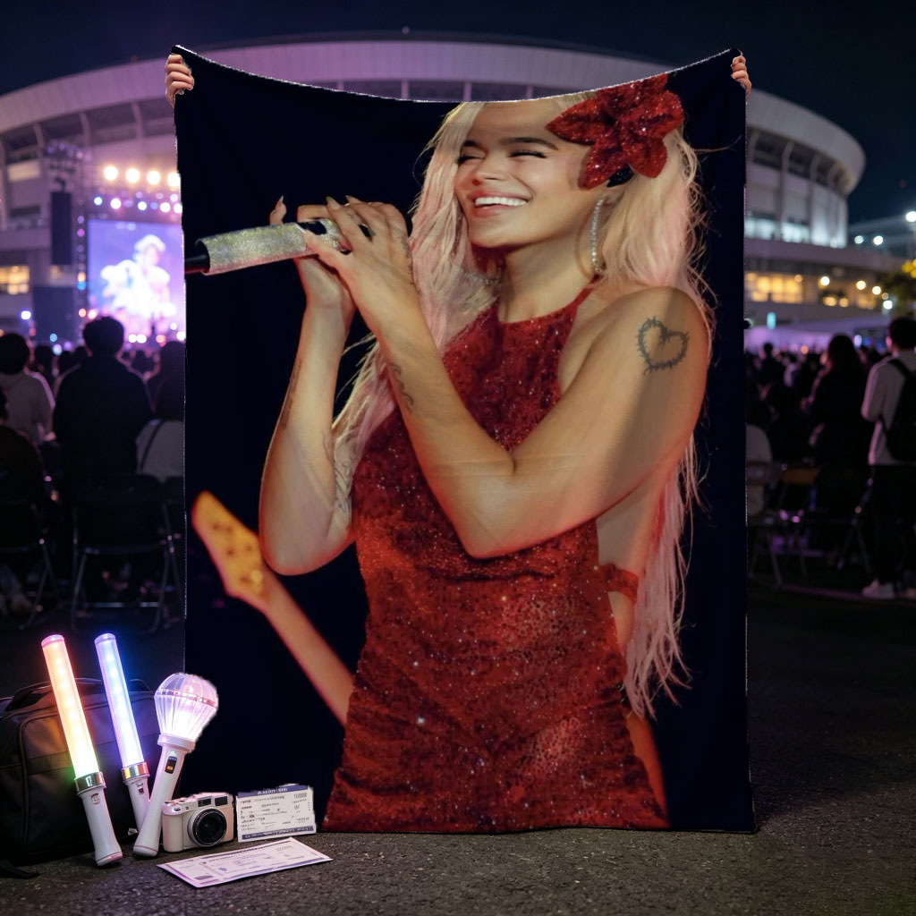 Bebe Rexha Performing on Stage in a Sparkling Red Dress with a Flower Hair Accessory - Blankets
