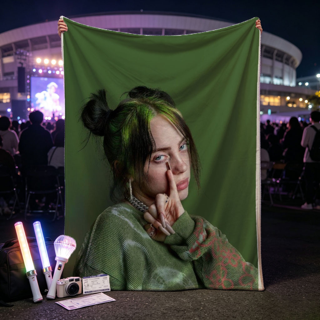 Billie Eilish in Studio Portrait Wearing Green Knit Sweater with Hair in Buns and Fingers on Face - Blankets