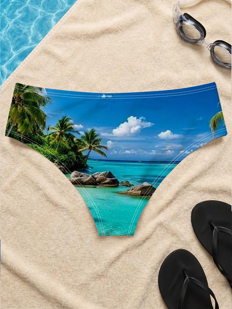 Couple relaxing on a tropical beach with turquoise waters and palm trees -  Men's swim trunks