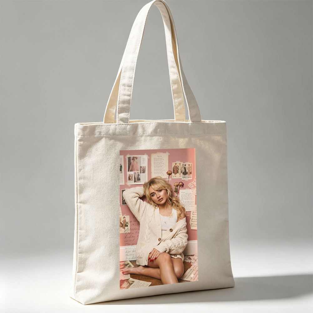 Sabrina Carpenter Sitting on Floor in Cozy Knit Cardigan Against Pink Wall with Vintage Photos and Letters - Canvas tote bags
