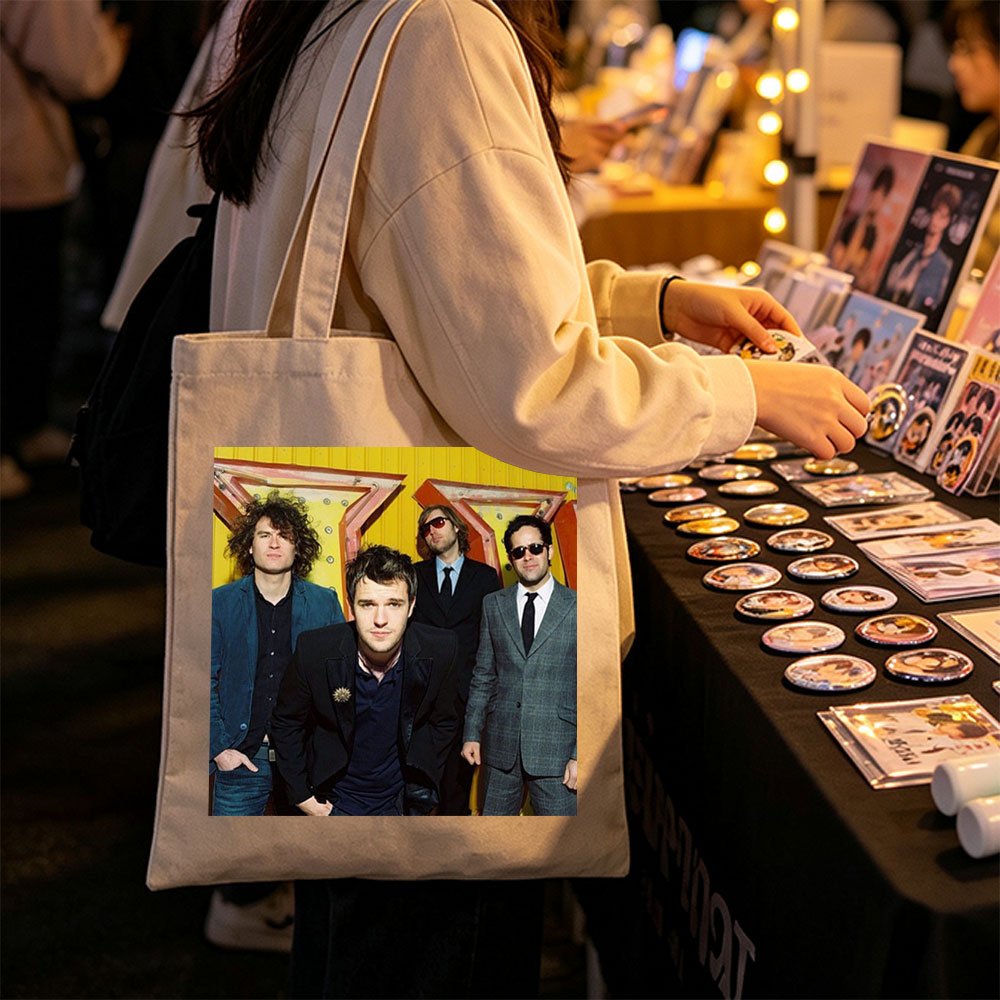 The Killers Band Members in Formal Wear Against a Vibrant Yellow Background - Canvas tote bags