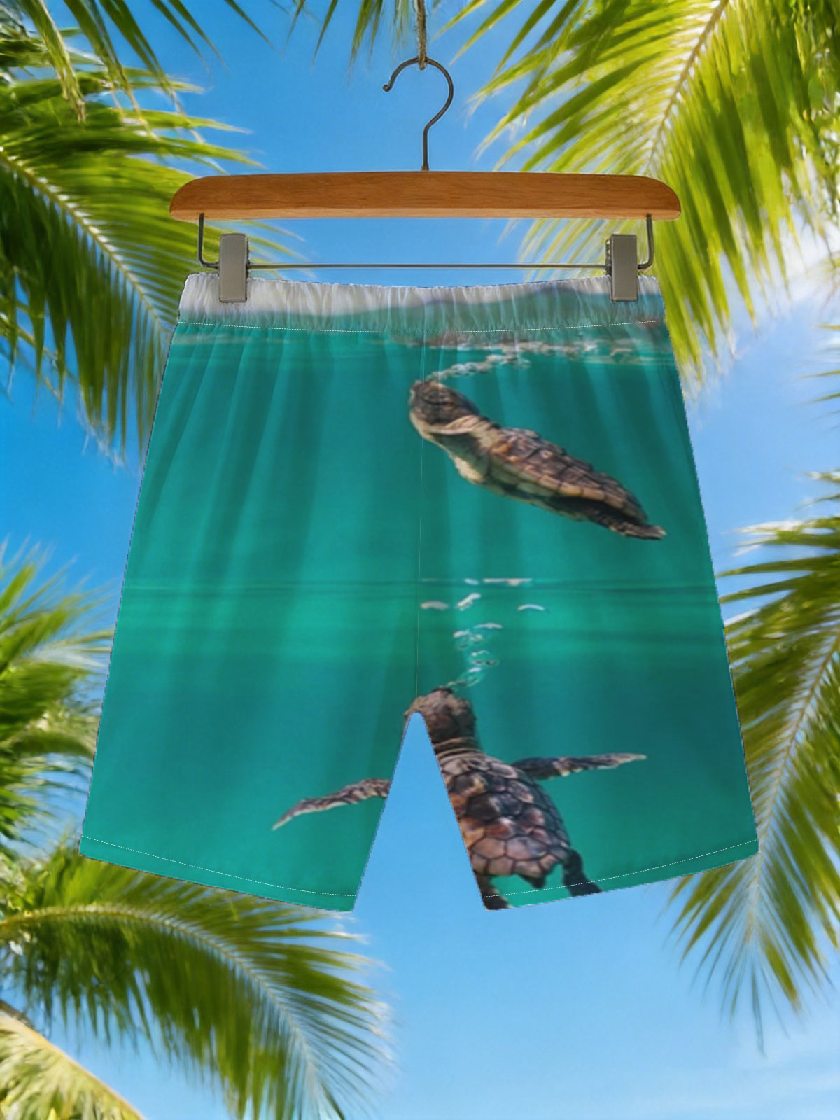 Sea turtles swimming above and below water surface -  Beach shorts