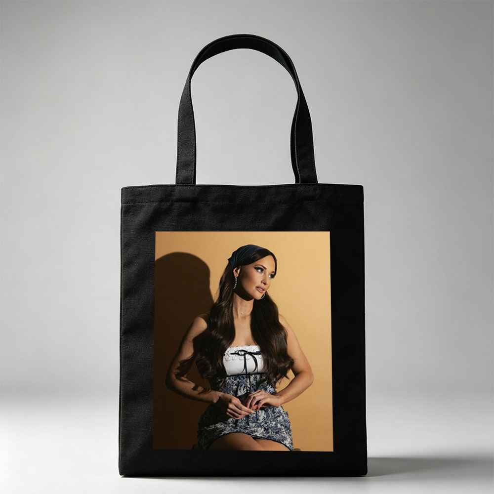 Lana Del Rey in a Stylish Blue and White Dress with Lace-Up Detail on a Warm Background - Canvas tote bags