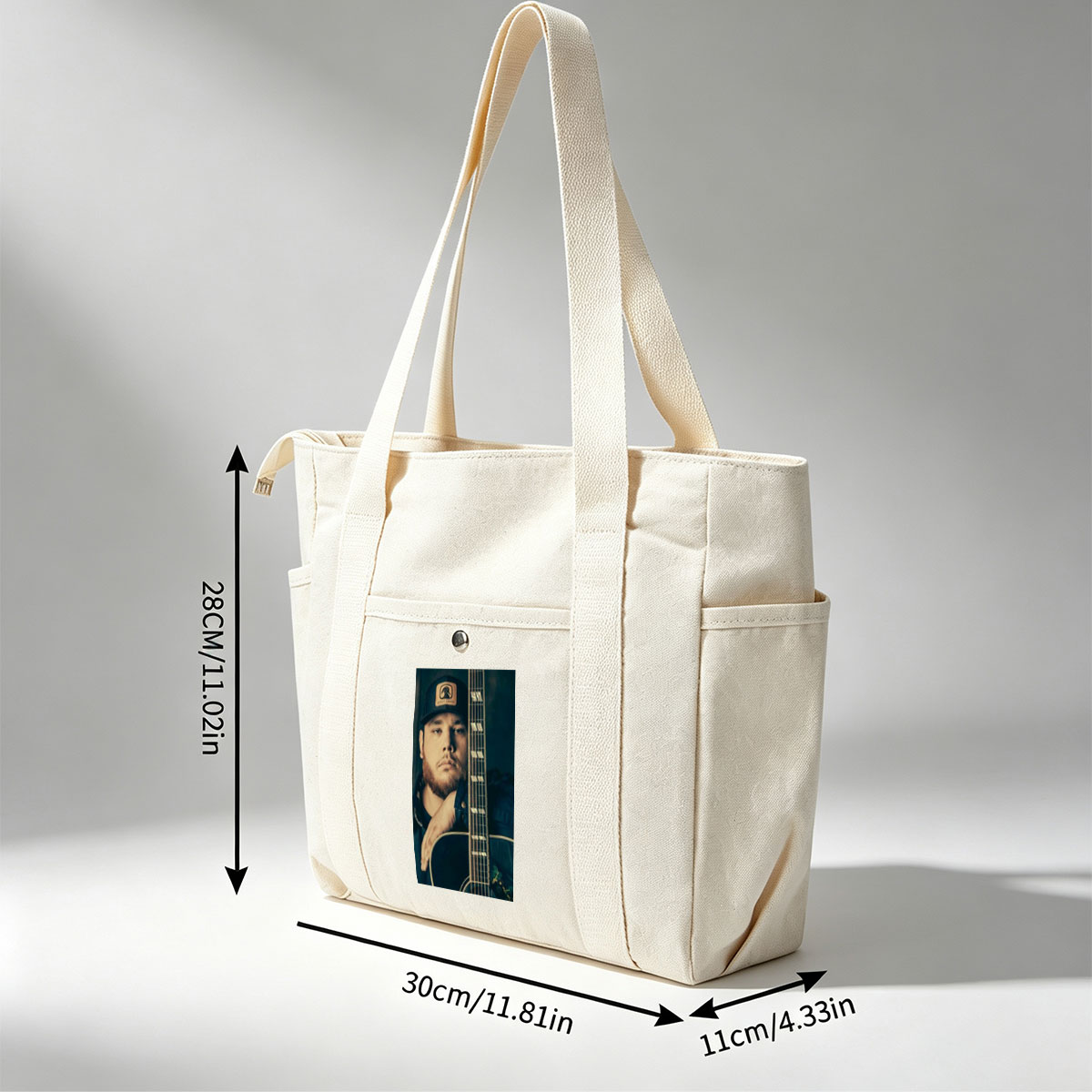 Luke Combs Holding Acoustic Guitar in Studio Portrait - Multi-pocket bags