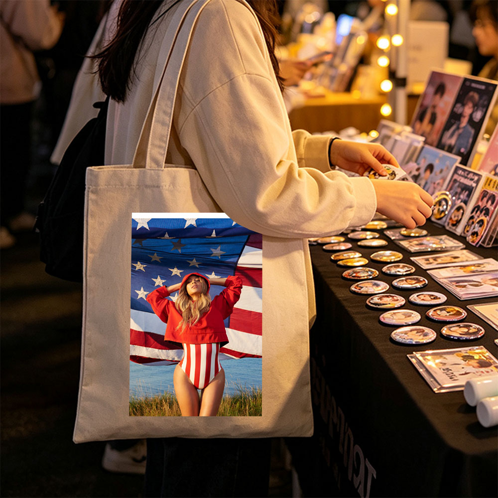 Beyonce in Red Hoodie and Striped Bodysuit Standing Before American Flag by the Beach - Canvas tote bags
