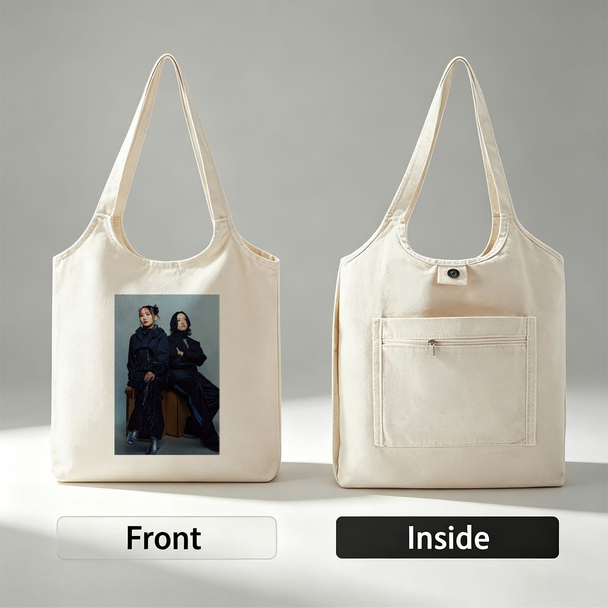 YOASOBI in a Stylish Studio Portrait Featuring Two Members Dressed in Dark, Edgy Fashion Sitting on Wooden Crates Against a Neutral Background - Canvas shoulder bags/