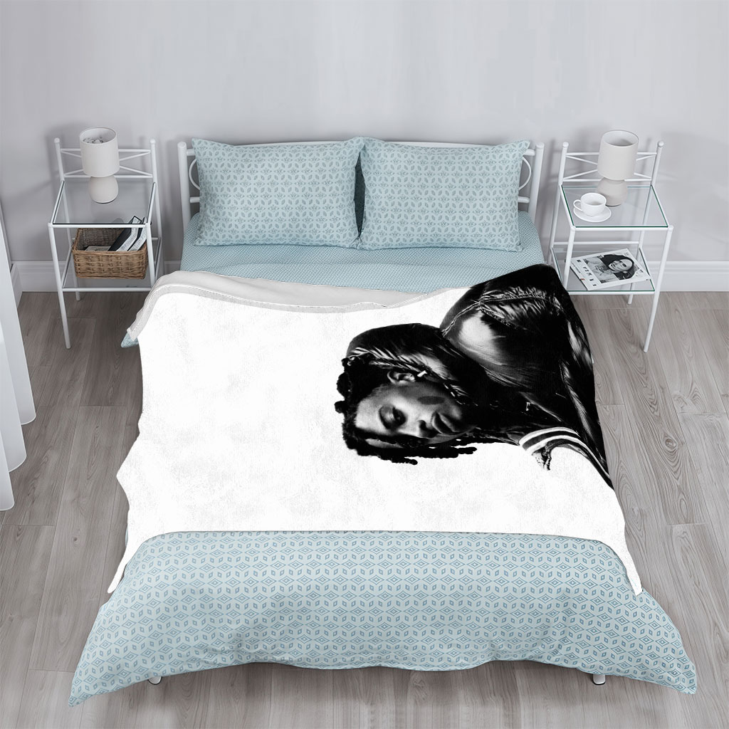 Lil Durk in a Bold Black Puffer Jacket Against a Stark White Background - Blankets