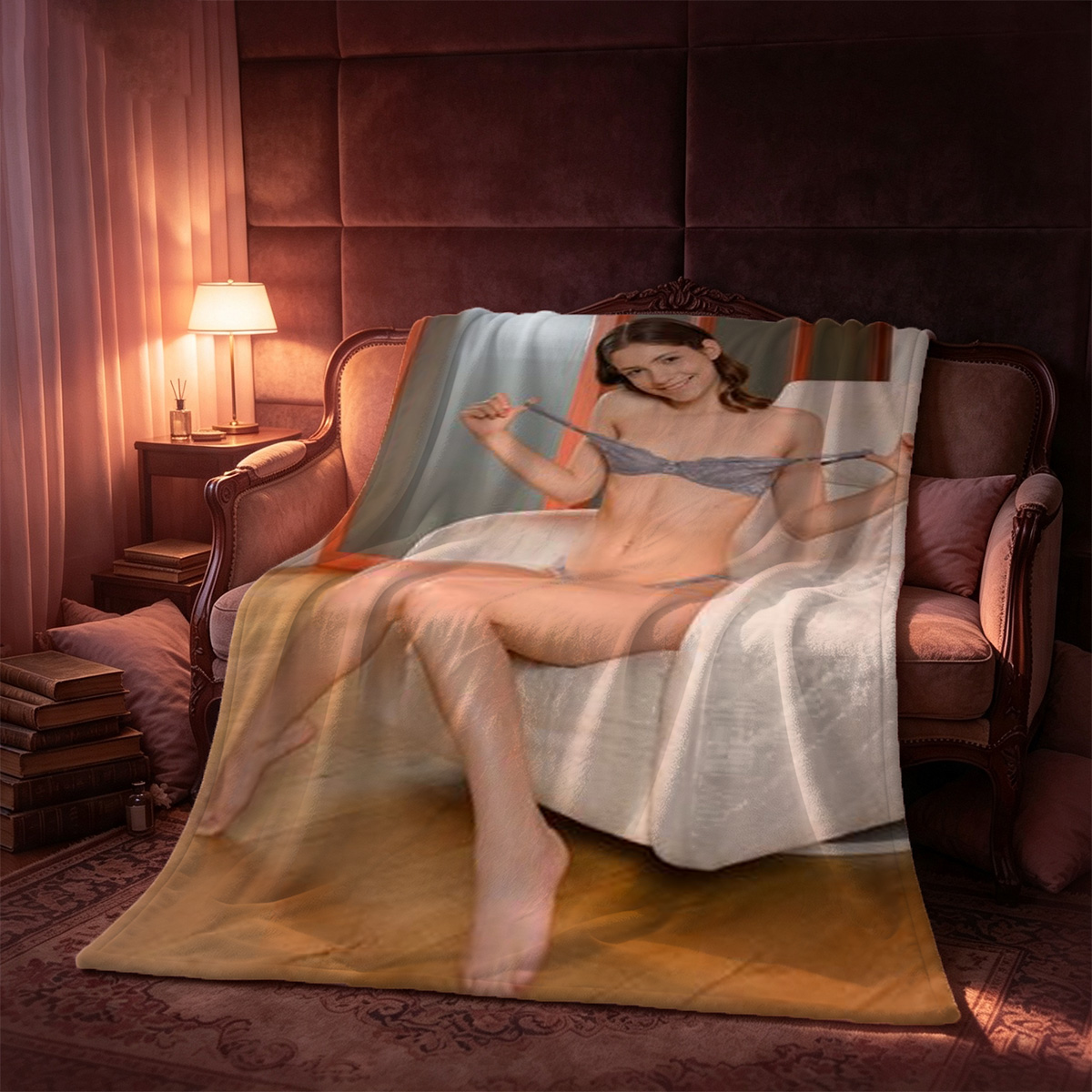 A beautiful Asian woman in black strappy cut-out fishnet lingerie lying seductively on a green couch. - Blanket