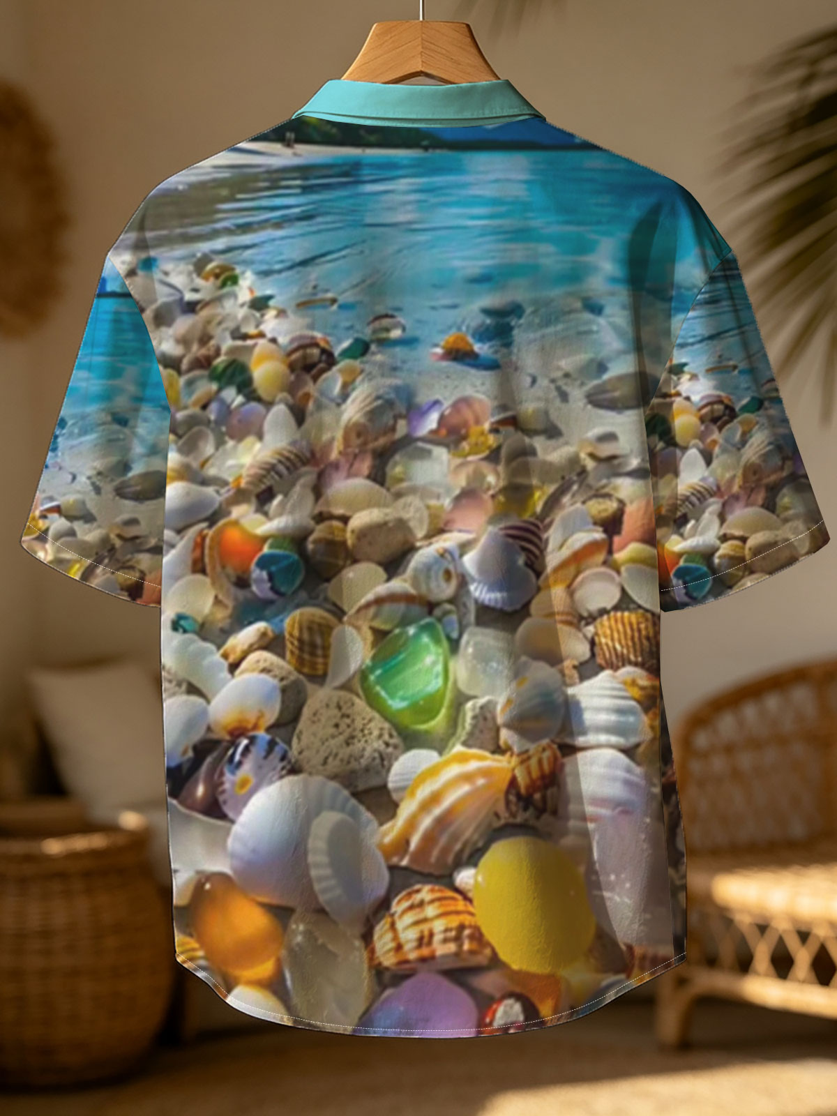 Colorful seashells on a tropical beach with clear blue water and sky. -  Shirt