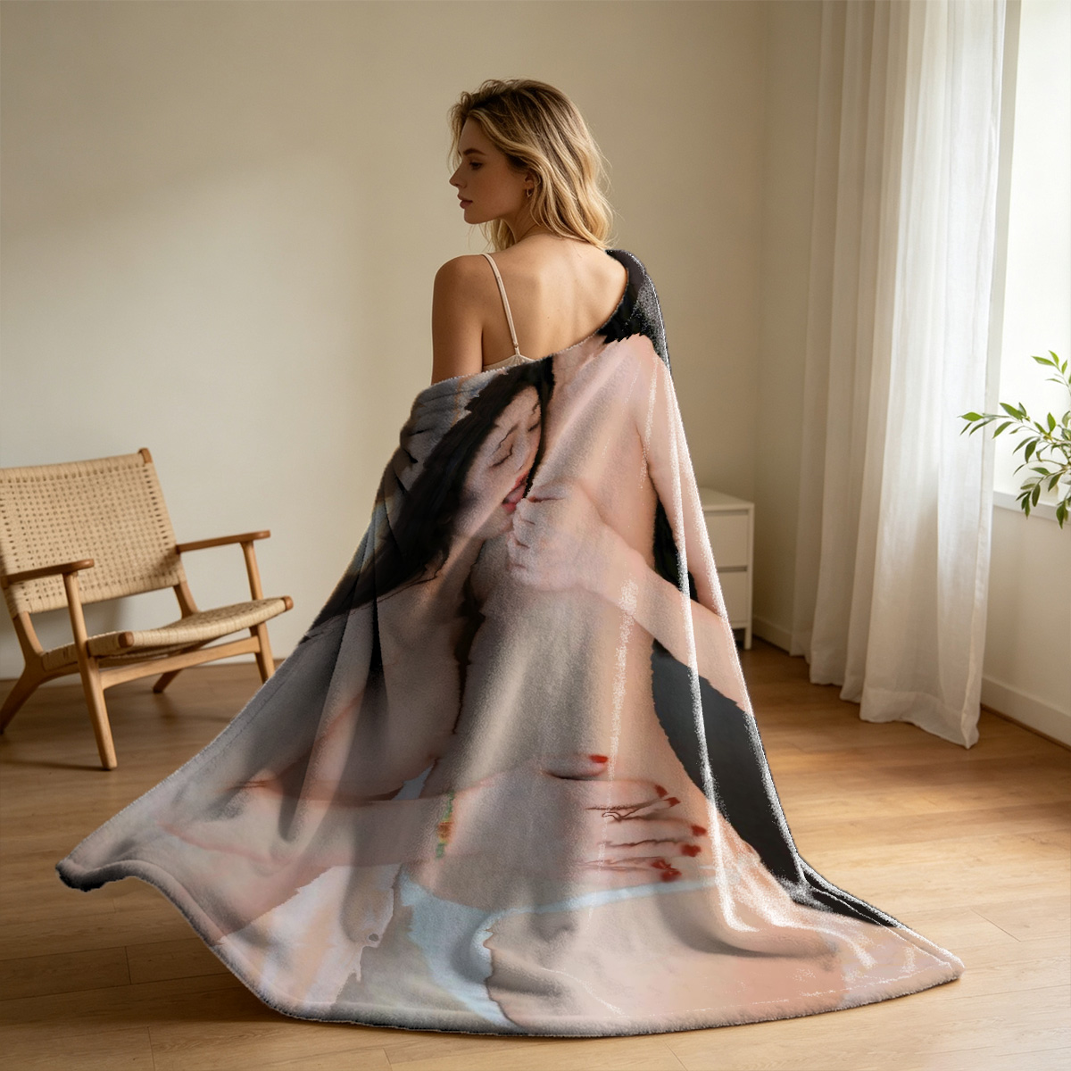 Nude woman with blue eyes lying on grey couch - Blanket