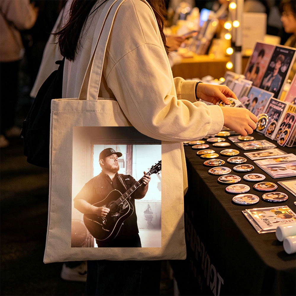 Luke Combs Playing Acoustic Guitar in a Sunlit Room - Canvas tote bags