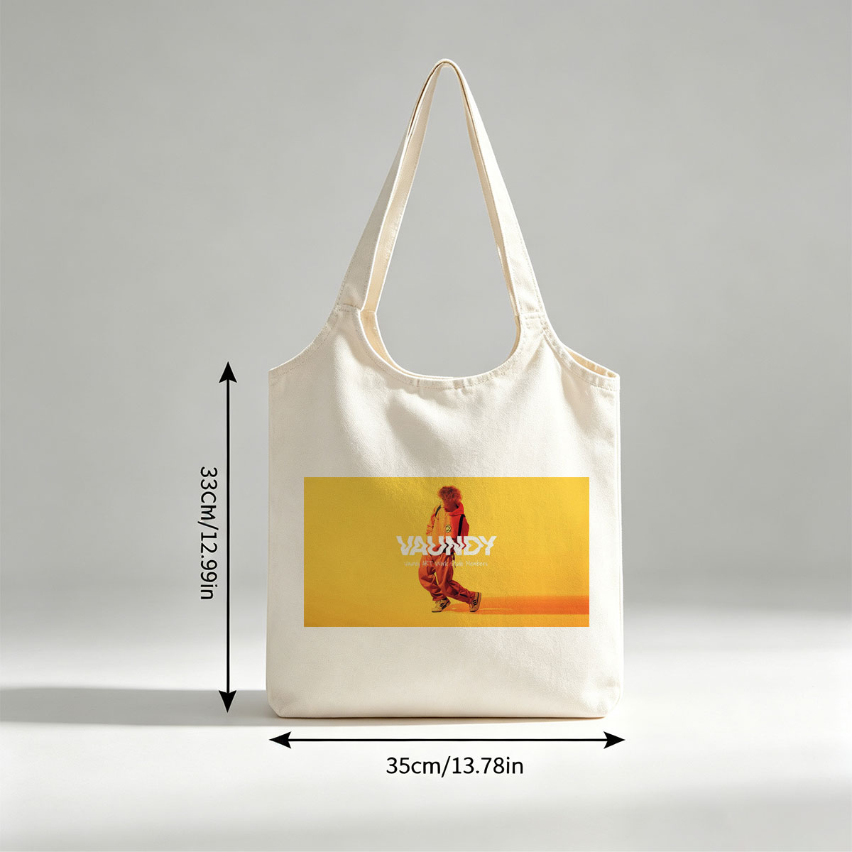 Vaundy in a Vibrant Yellow Studio Setting Wearing Orange Tracksuit and Sneakers - Canvas shoulder bags/