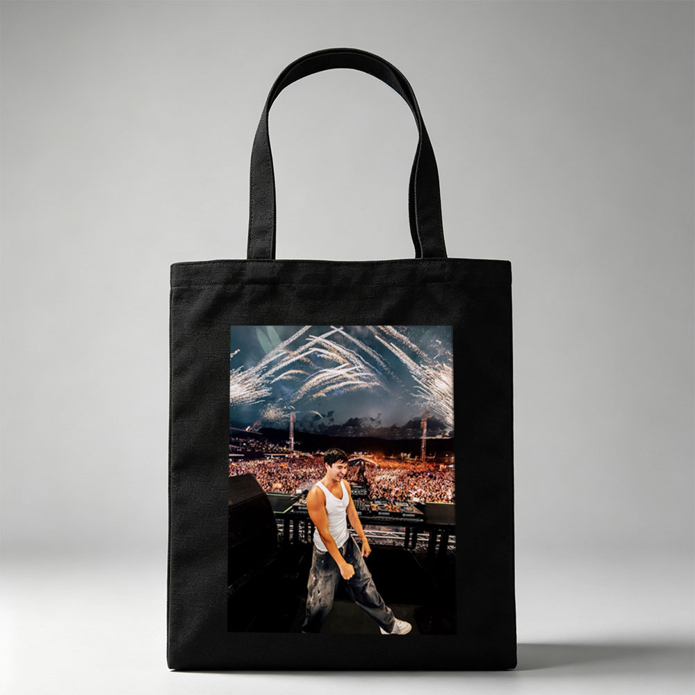 Martin Garrix Live Performance at Festival with Fireworks and Crowd in Background - Canvas tote bags