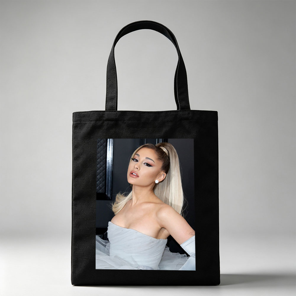Ariana Grande at a Red Carpet Event Wearing a Light Blue Strapless Gown with Tulle Skirt and High Ponytail Hairstyle - Canvas tote bags