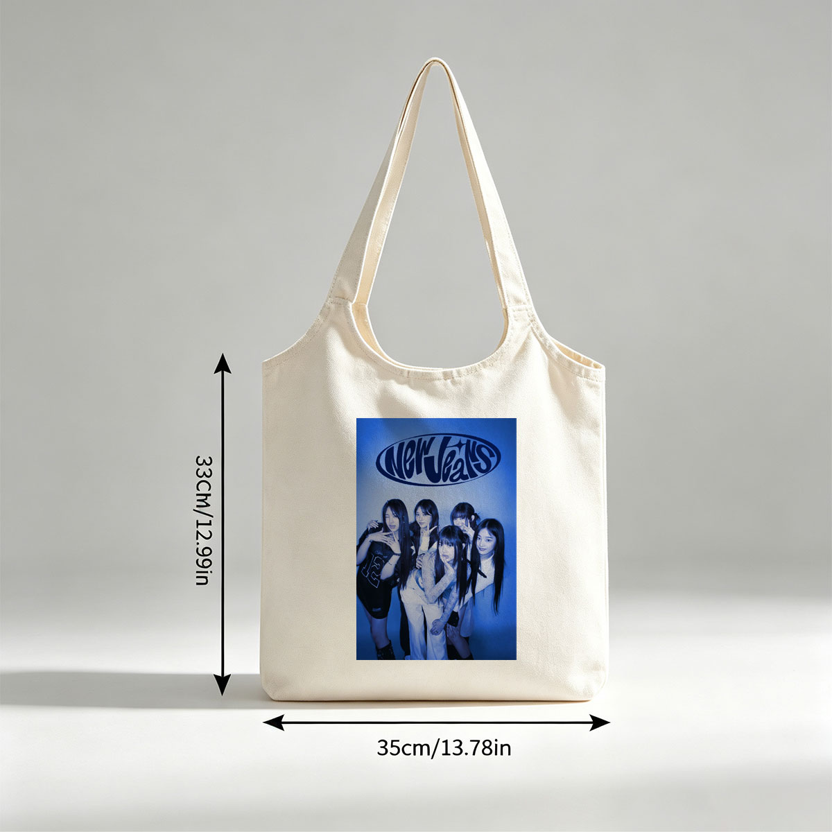 NewJeans Group Pose in Blue-Toned Studio Photo with Stylish Outfits and Confident Expressions - Canvas shoulder bags/
