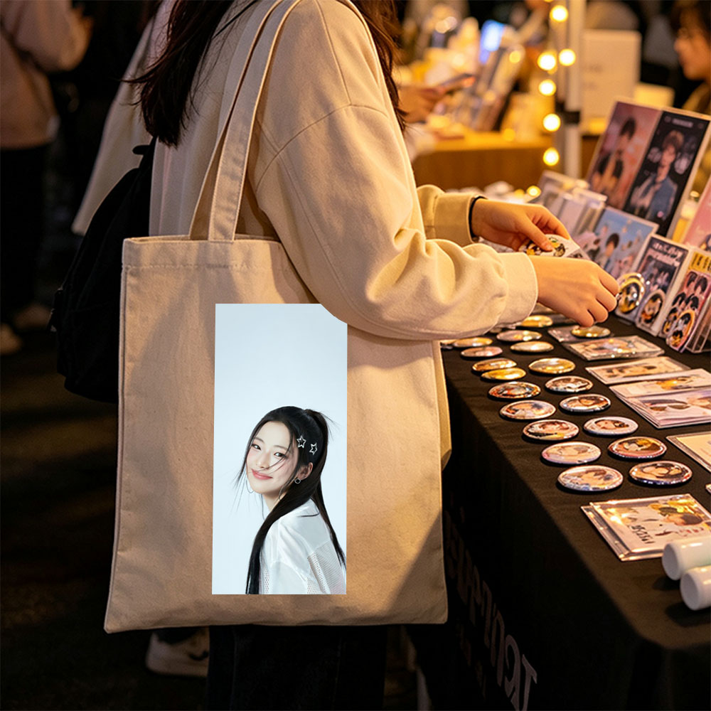 Korean Actress in White Outfit with Star Hair Clips Smiling Softly Against Light Blue Background - Canvas tote bags