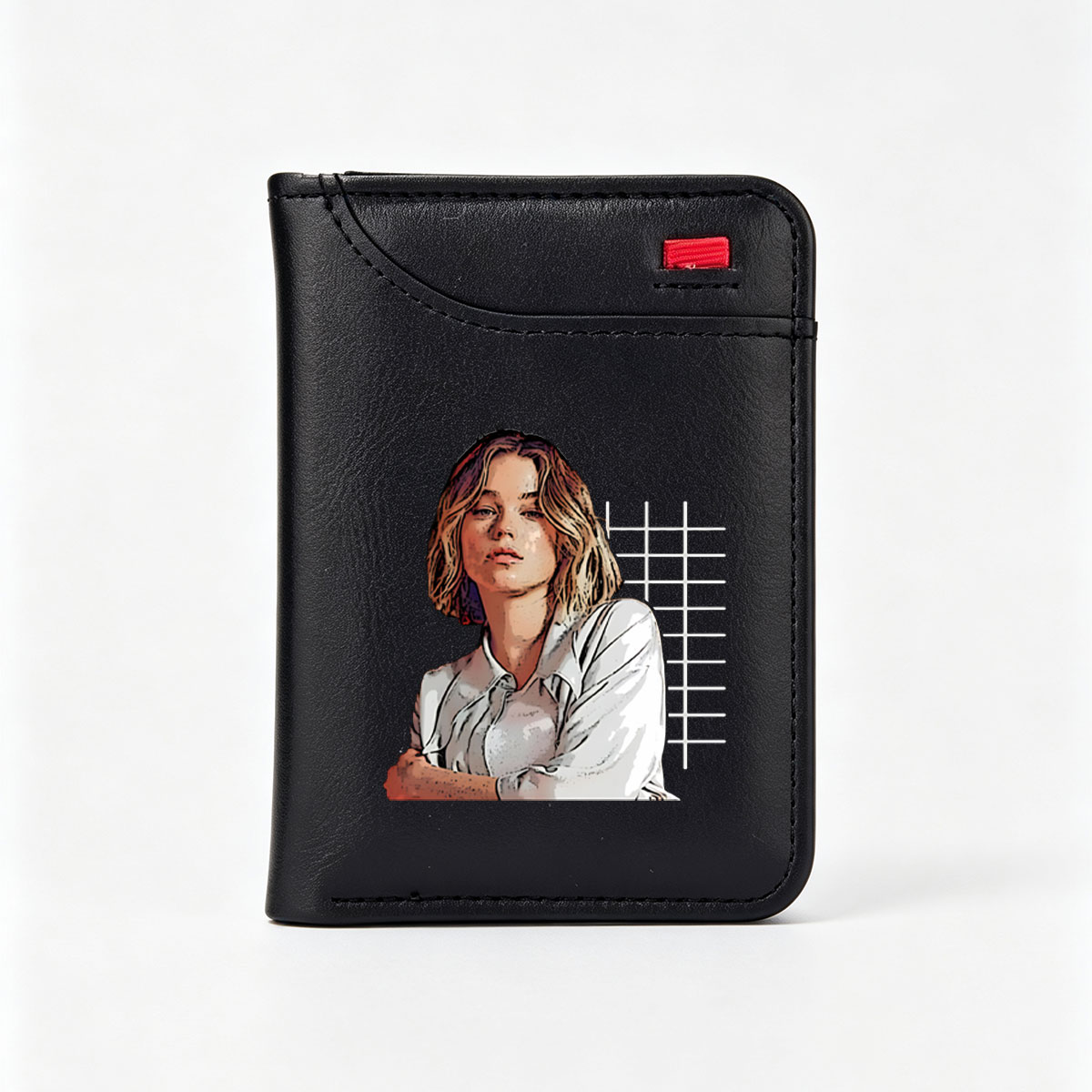Portrait of a woman with short blonde hair, wearing a white shirt, arms crossed, against a black background with a grid pattern. - Vertical Style Wallet