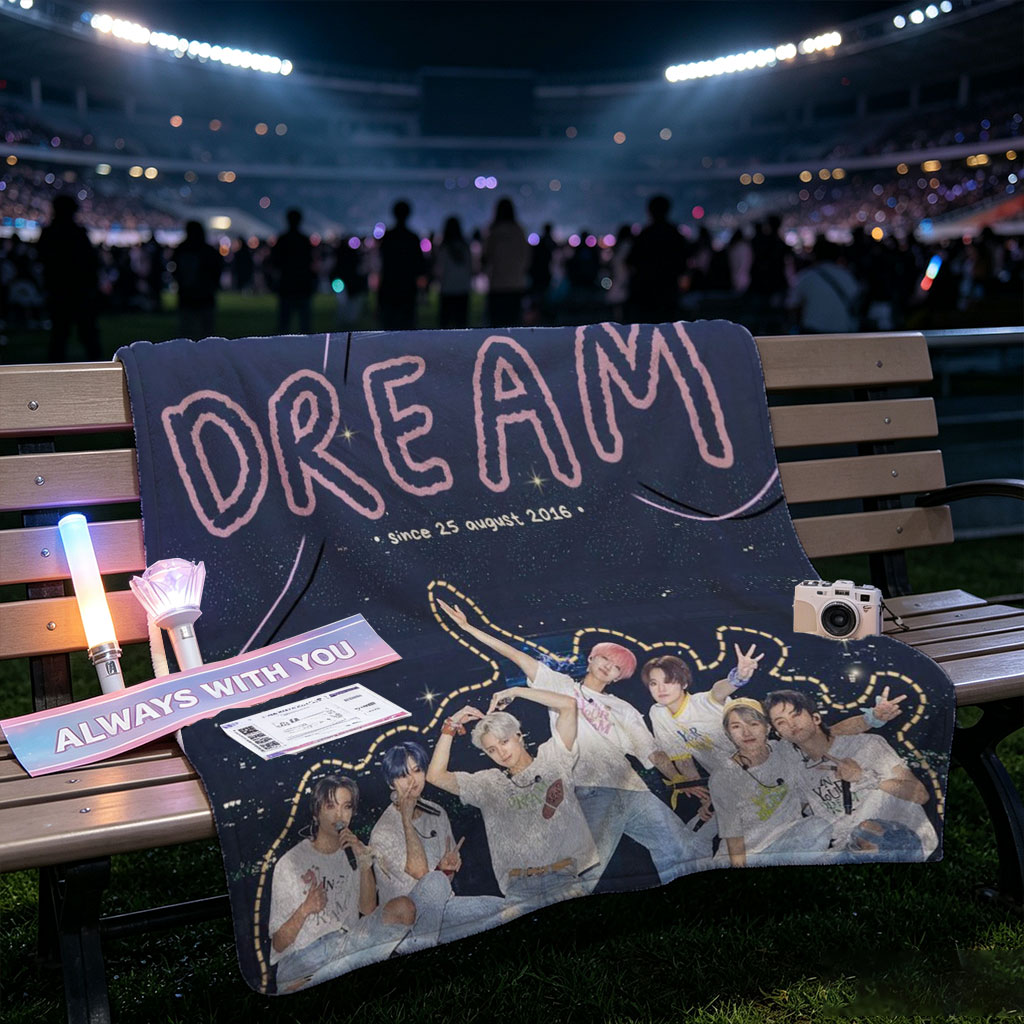 NCT DREAM on Stage Performance in Vibrant Group Photo with Cosmic Background - Blankets