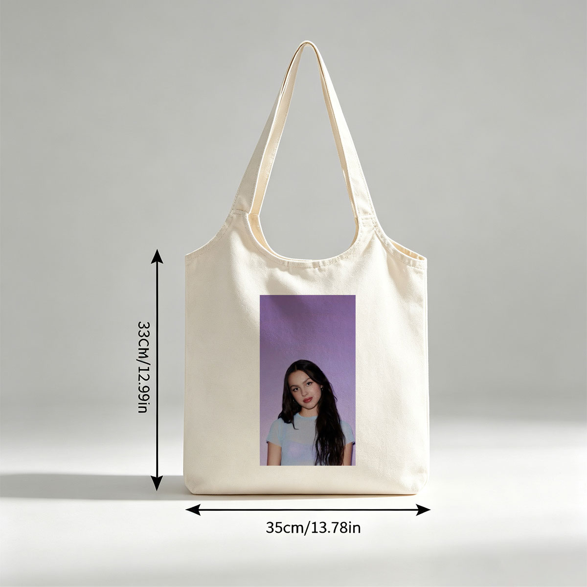 Olivia Rodrigo in a Soft Blue Top Against a Purple Gradient Background - Canvas shoulder bags/