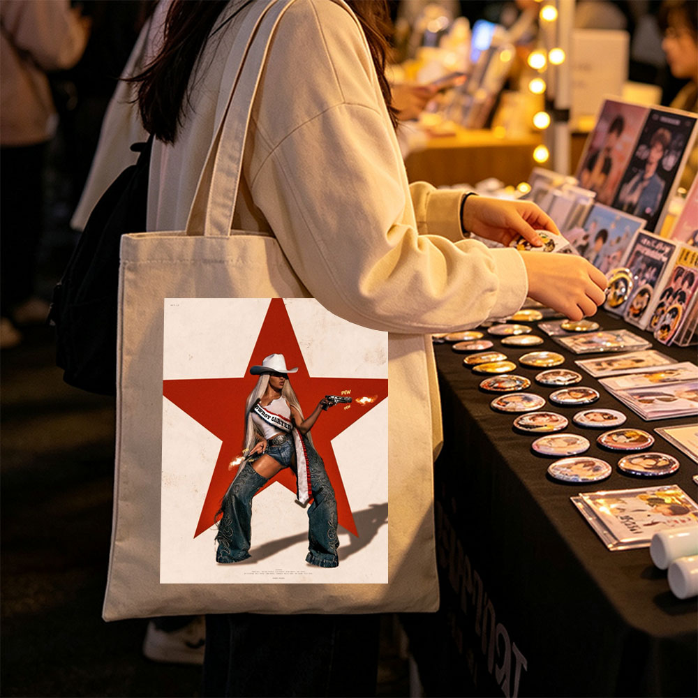 Cardi B in Cowboy Outfit Holding Guns Against Red Star Background - Canvas tote bags