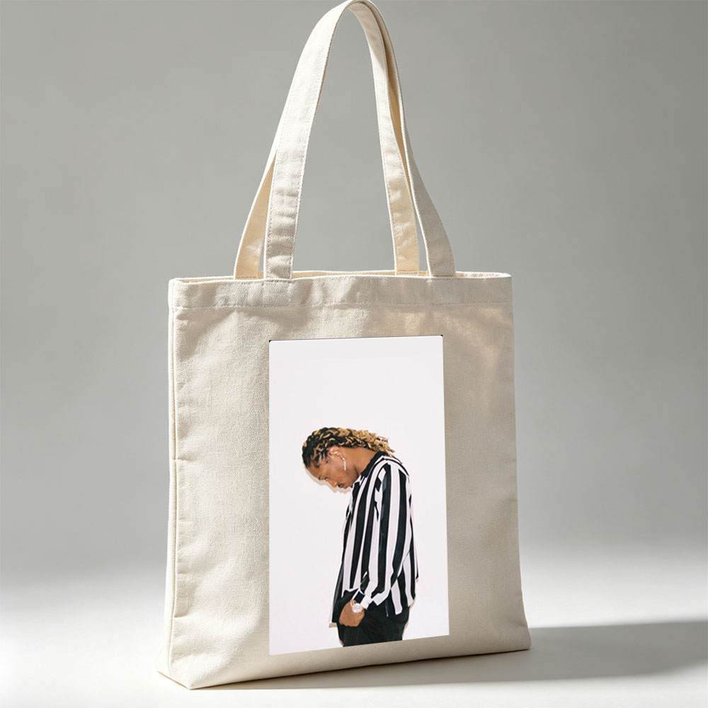 Lil Durk in a Striped Shirt with Braided Hair Against a White Background - Canvas tote bags