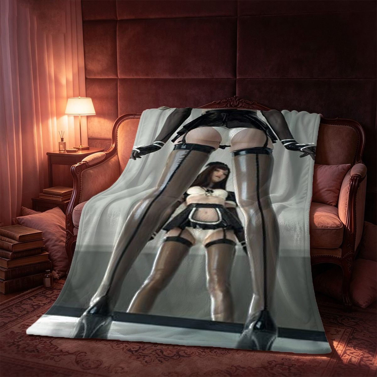 A woman in a black dress lying on a bed. - Blanket