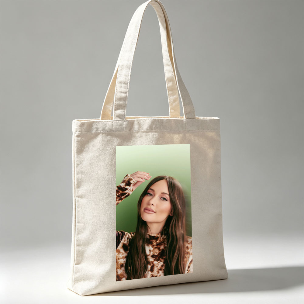 Olivia Rodrigo in a Fashion Portrait Wearing a Leopard Print Top Against a Green Background - Canvas tote bags