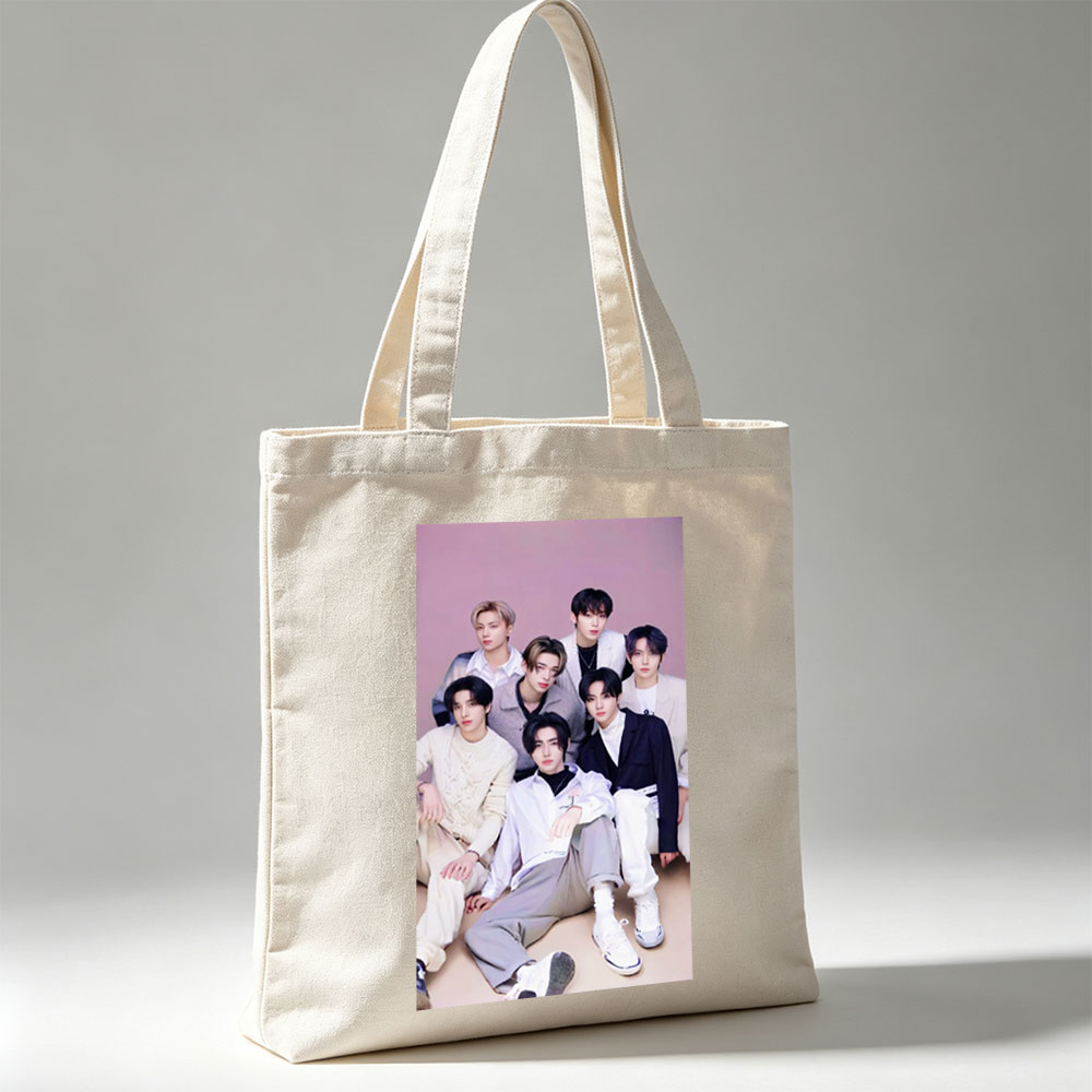 ENHYPEN Group Photo in Stylish Outfits Against Soft Pink Background - Canvas tote bags
