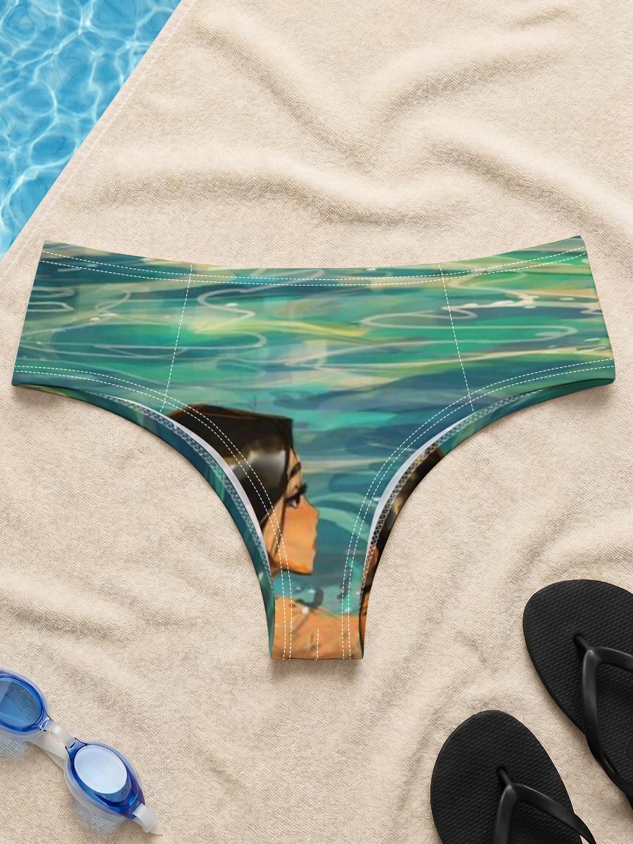 Woman swimming in clear blue water near rocky shore -  Men's swim trunks