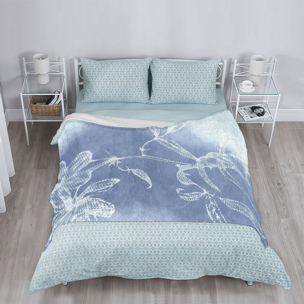 Taylor Swift in a Dreamy Floral Scene with Ethereal Blue and White Botanical Patterns - Blankets