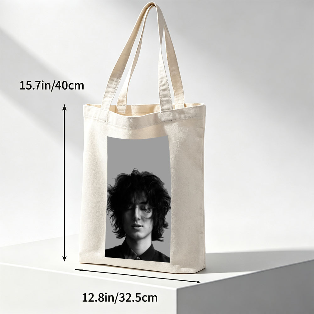 Timothée Chalamet Close-Up Black and White Portrait with Messy Hair and Closed Eyes - Canvas tote bags