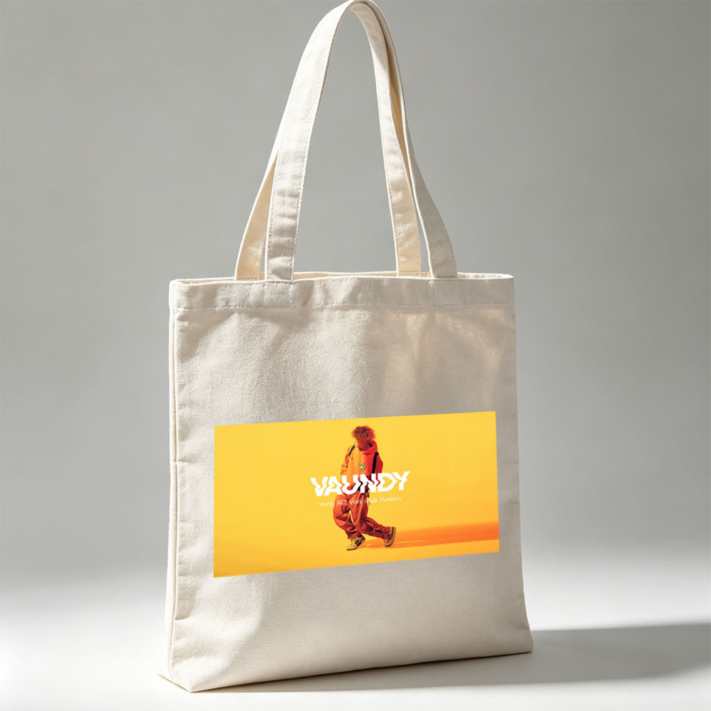 Vaundy in a Vibrant Yellow Studio Setting Wearing Orange Tracksuit and Sneakers - Canvas tote bags