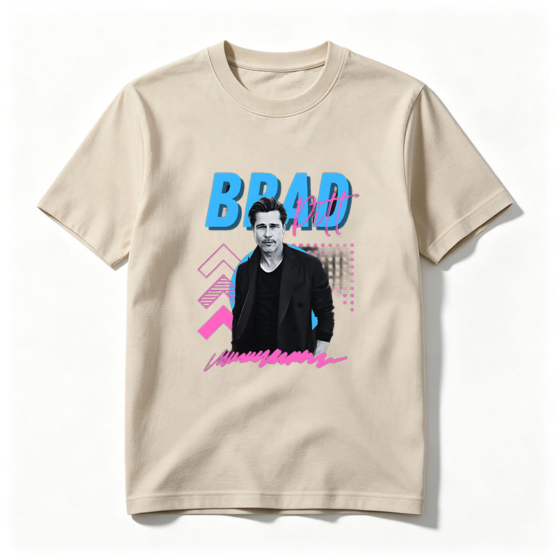 Brad Pitt in a stylish black suit against a vibrant graphic background with bold text and geometric patterns. - Tee