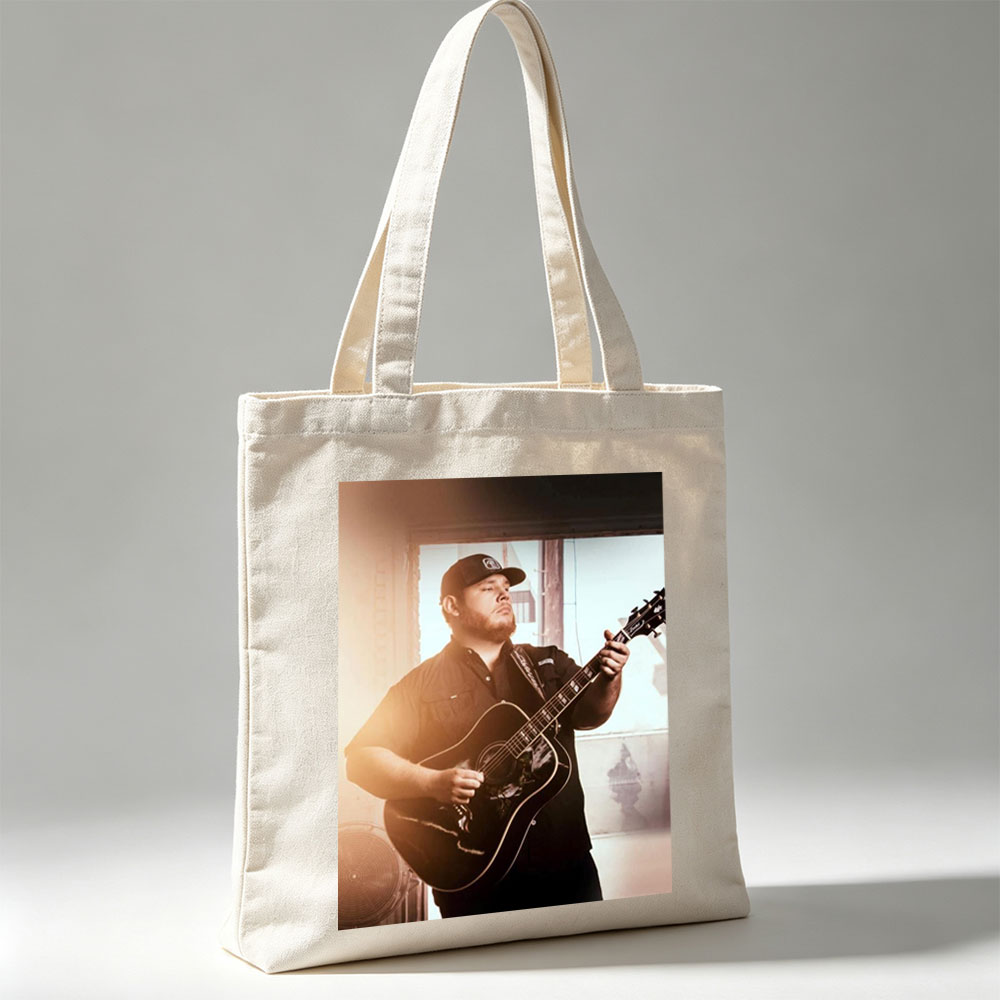 Luke Combs Playing Acoustic Guitar in a Sunlit Room - Canvas tote bags