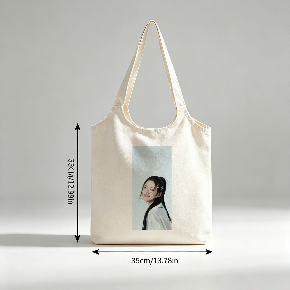 Korean Actress in White Outfit with Star Hair Clips Smiling Softly Against Light Blue Background - Canvas shoulder bags/