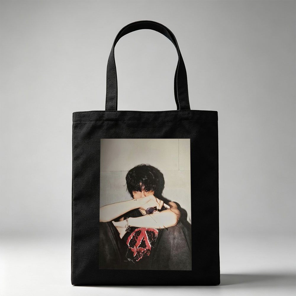 Hyunjin of Stray Kids in a Moody Pose with Sunglasses and Cross Tattoo, Wearing a Black T-Shirt with Red Peace Symbol Design - Canvas tote bags