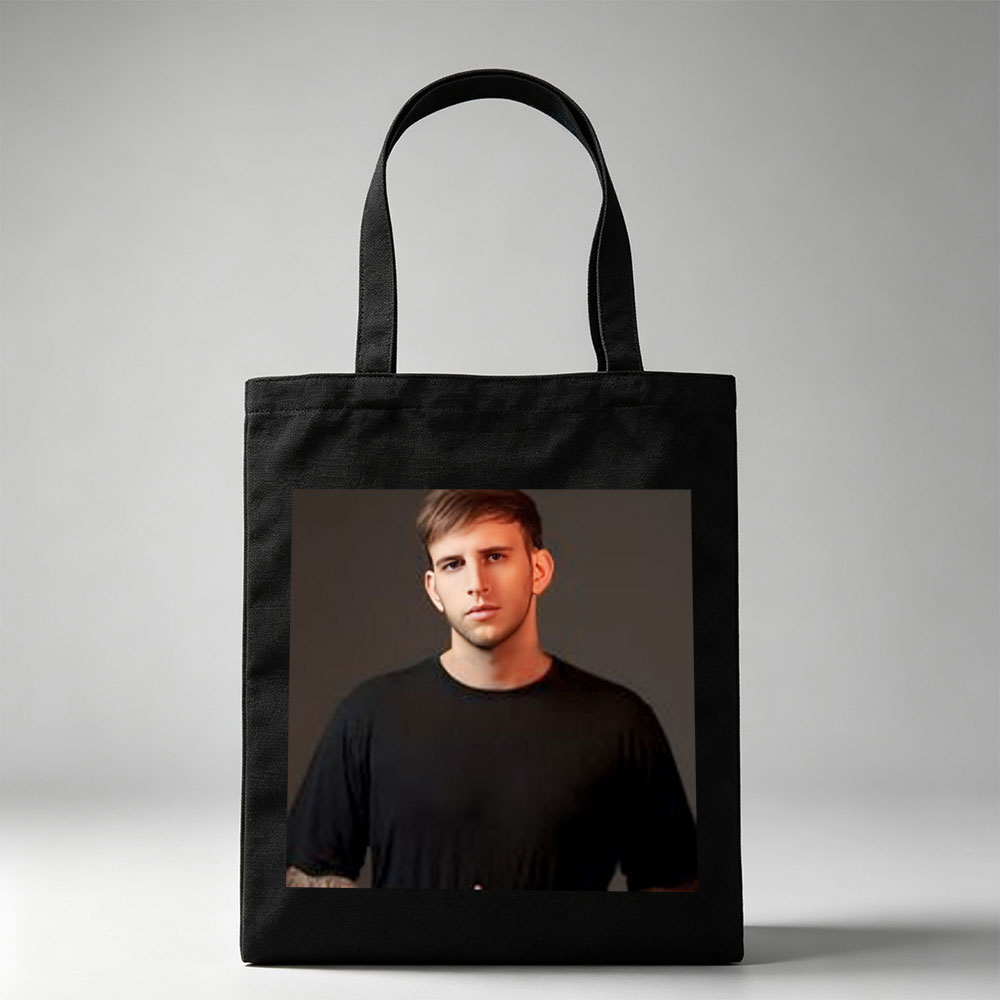 Logan Paul in a Studio Portrait Wearing a Black T-Shirt - Canvas tote bags