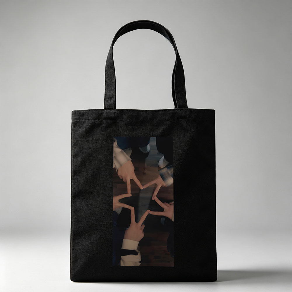 BTS Members Forming a Star with Their Hands on Wooden Floor - Canvas tote bags