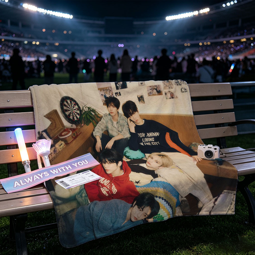 Stray Kids Relaxing in Cozy Living Room with Colorful Blankets and Wall Art - Blankets