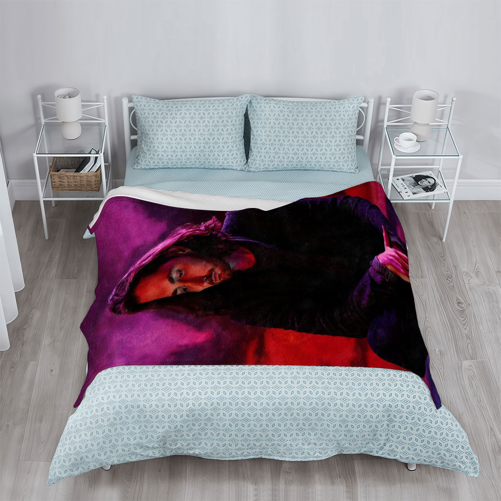 Hozier Sitting in a Dramatic Purple and Red Sky Scene - Blankets