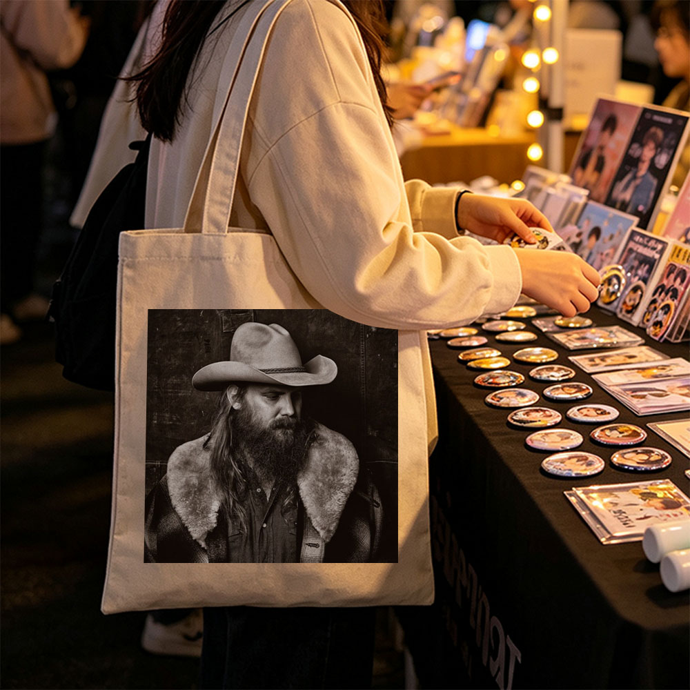 Chris Stapleton in a Cowboy Hat and Fur-Collared Jacket, Gazing Thoughtfully in a Monochrome Portrait - Canvas tote bags