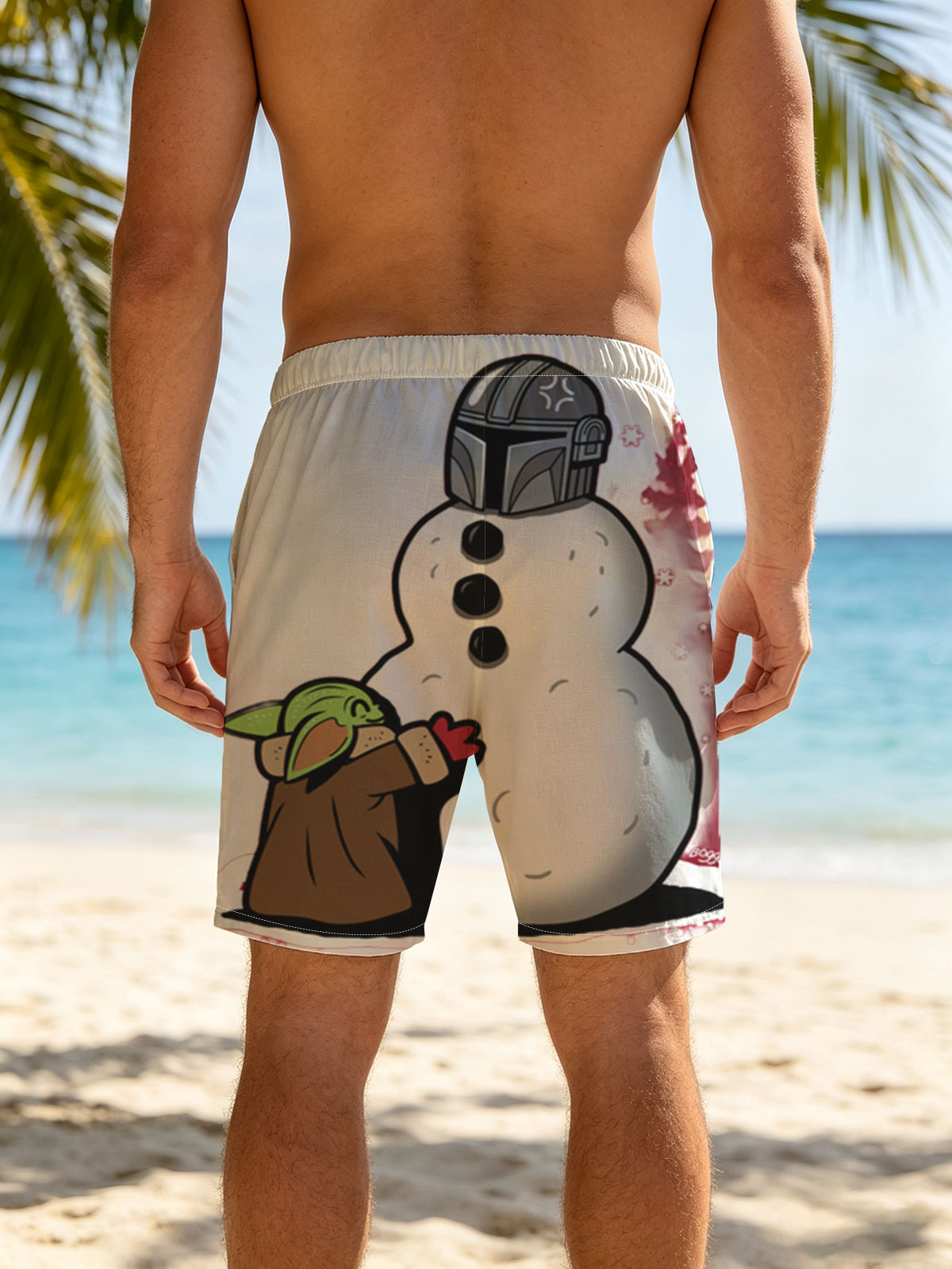 Baby Yoda Builds a Snowman with Mandalorian Helmet -  Beach shorts