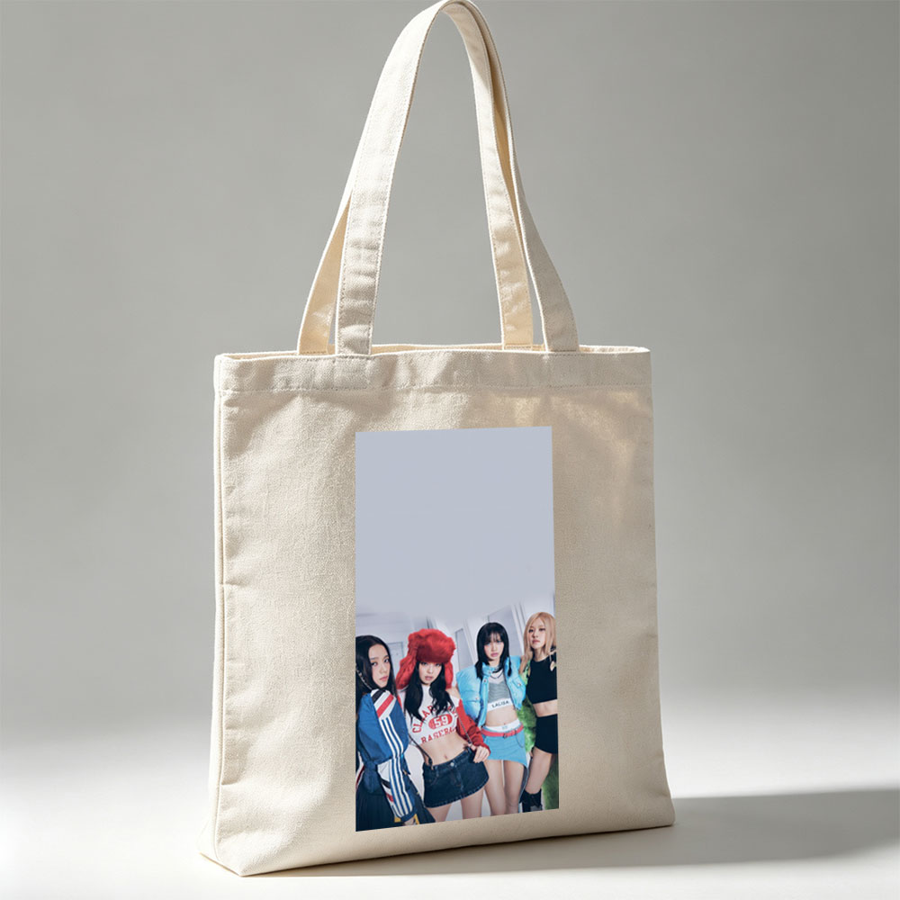 BLACKPINK in a stylish group photo wearing trendy outfits and posing confidently indoors - Canvas tote bags