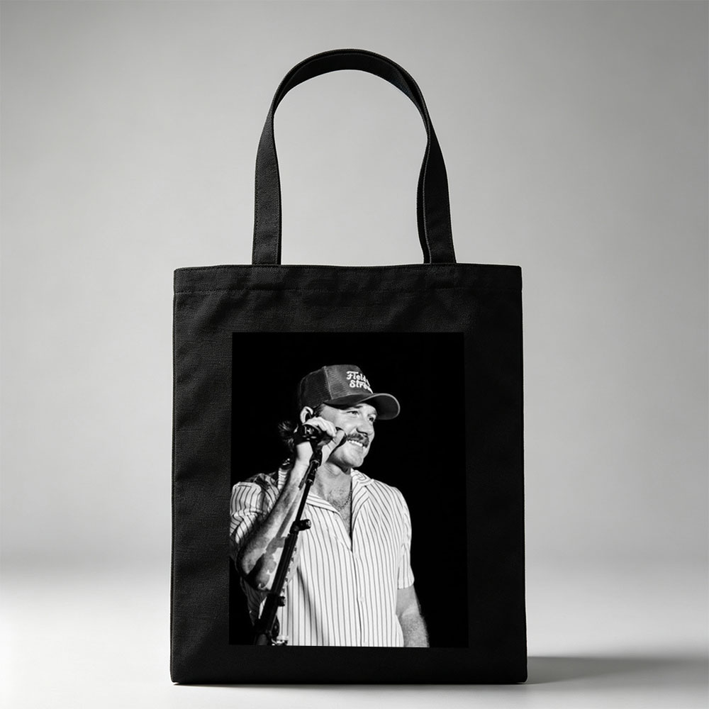 Ronnie Milsap Performing on Stage with Microphone in Black and White Photo - Canvas tote bags