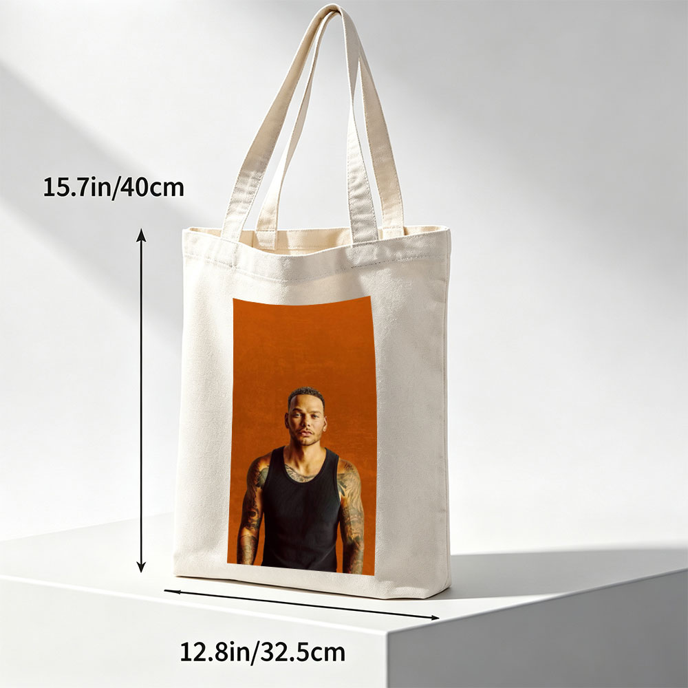 Liam Payne Standing in Black Tank Top with Visible Tattoos Against Orange Background - Canvas tote bags