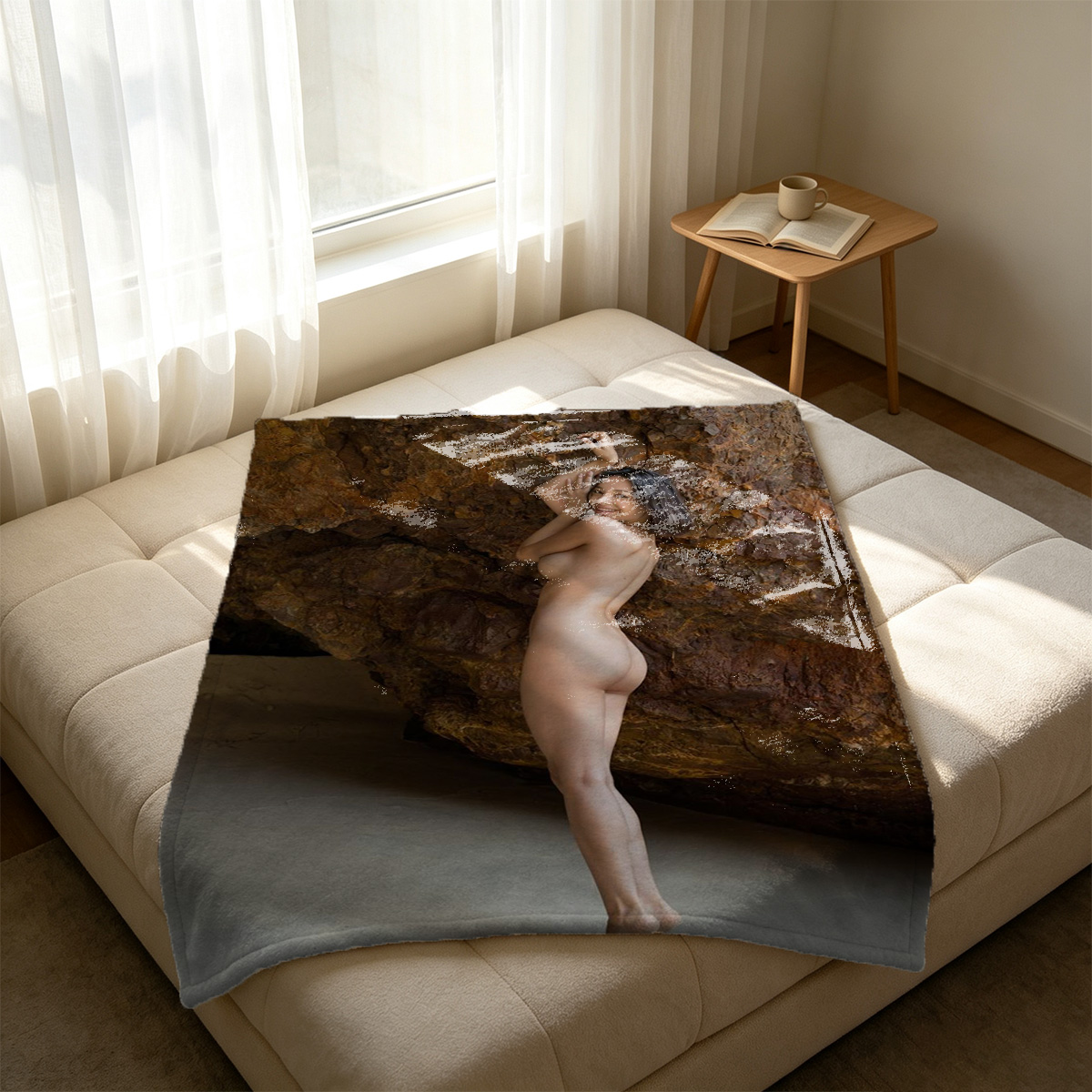 Blonde woman in sheer bodysuit posing on couch - Blanket