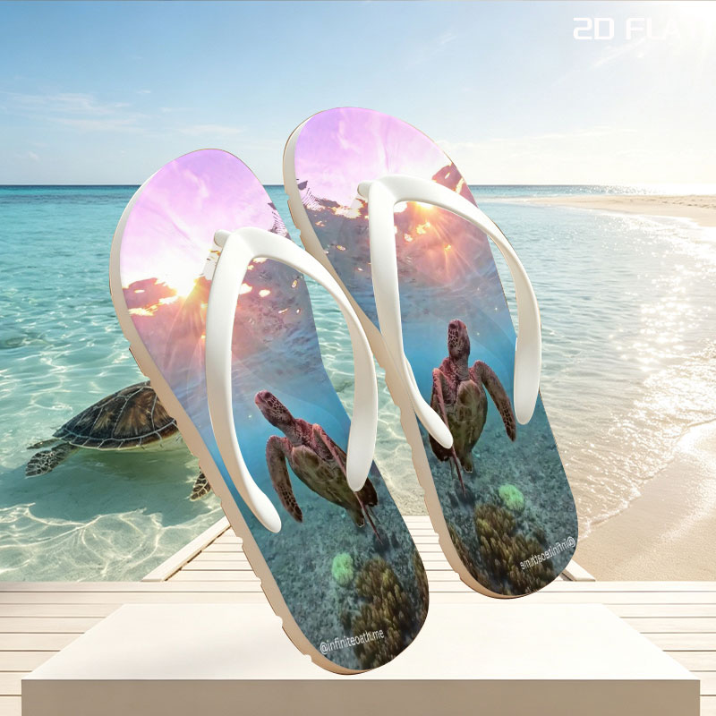 Sea turtle swims gracefully underwater as sunlight filters through the ocean surface. -  flip-flops