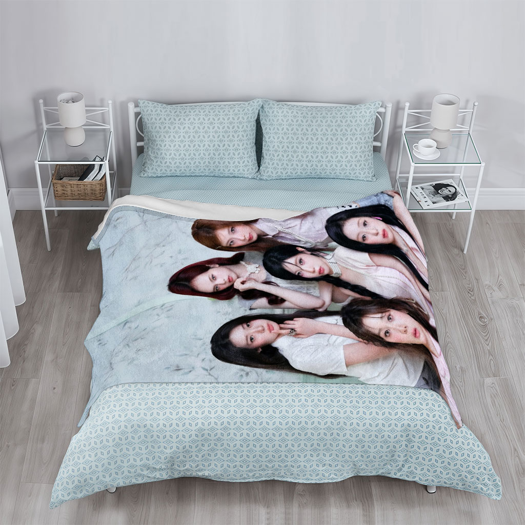 NMIXX Group Portrait in Elegant Pink Outfits Against Floral Background - Blankets